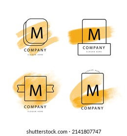 conjunto de plantillas de logotipo de letra m pintadas a mano