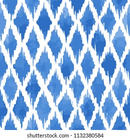 Hand painted messy rhombuses background in blue. Seamless vector pattern