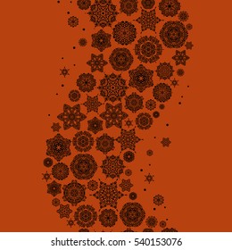 Hand painted pattern. Vector seamless pattern with abstract hand drawn snowflakes design on a orange background.