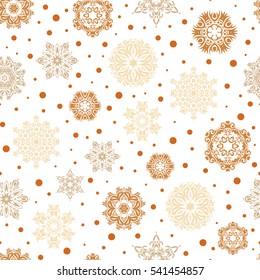 Hand painted pattern. Vector seamless pattern with abstract hand drawn orange and beige snowflakes design on a white background.