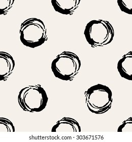Hand painted round brush strokes seamless pattern. Hand drawn chaotic ink circles. Expressive monochrome strokes. Black and white vector illustration.