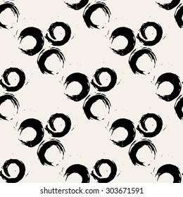 Hand painted round brush strokes seamless pattern. Hand drawn chaotic ink circles. Expressive monochrome strokes. Black and white vector illustration.