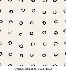 Hand painted round brush strokes seamless pattern. Hand drawn chaotic ink circles. Expressive monochrome strokes. Black and white vector illustration.