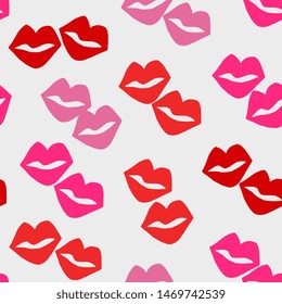 Hand painted seamless pattern with lips in red and pink on white background.