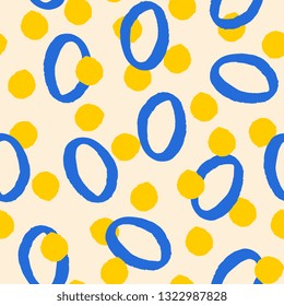 Hand painted seamless pattern with shapes in blue and yellow on vanilla background.