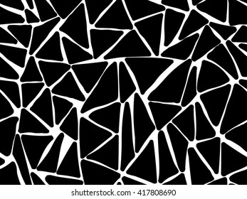 Hand painted triangle shapes in black on white background. Seamless abstract repeating hand drawn background.