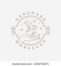 Hand and paper bird in a circle for handmade workshop logo business, design illustration logo.
