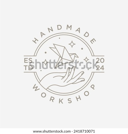 Hand and paper bird in a circle for handmade workshop logo business, design illustration logo.
