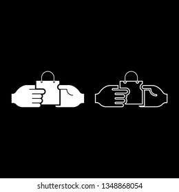 Hand passes the package to the other hand Hand pass bag other hand Concept commerce Idea trade Market subject Marketing icon set white color vector illustration flat style simple image