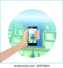 hand with the phone with game on the background of the map