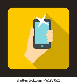 Hand photographed on a mobile phone icon in flat style with long shadow. Device symbol