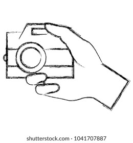 hand with photographic camera