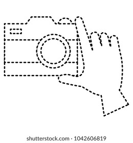 hand with photographic camera