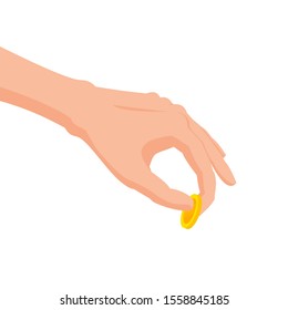 A hand picking a coin