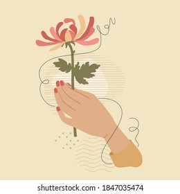 Hand with pink chrysanthemum flower over modern abstract shapes. Vector fashion vintage style illustration isolated on beige background. Feminine beauty concept.