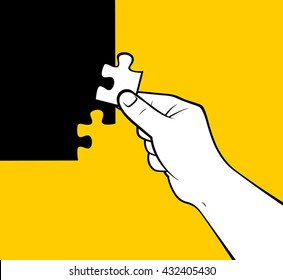 Hand placing puzzle piece