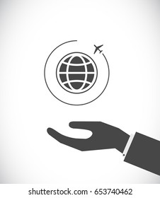 mano con plano y globo globo - icono de concepto