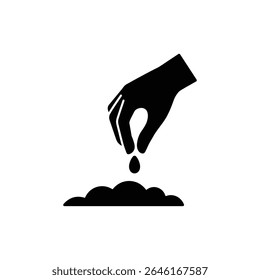 Hand planting seed in soil representing agriculture and growth