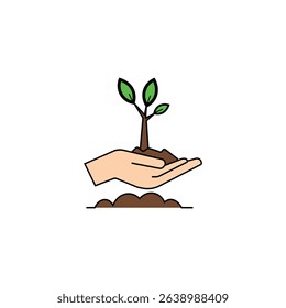 Hand planting seedling into soil