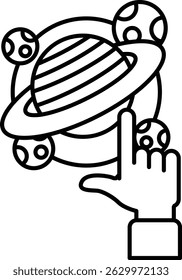 A hand pointing at a black and white drawing of a planet. The drawing is of a planet with a moon and a star