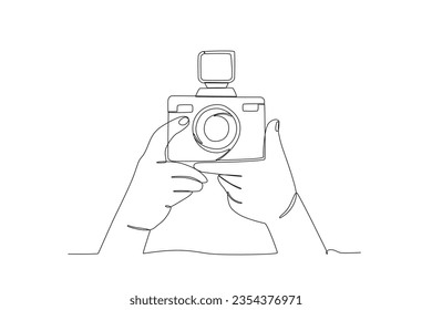 Una mano se prepara para tomar fotos. Dibujo de una línea del día mundial de la fotografía