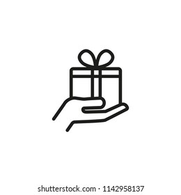 Hand with present icon. Gift, surprise, package. Holiday concept. Vector illustration can be used for topics like celebration, birthday, anniversary