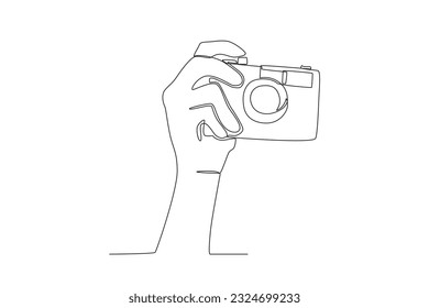 A hand presses the camera button. World photography day one-line drawing