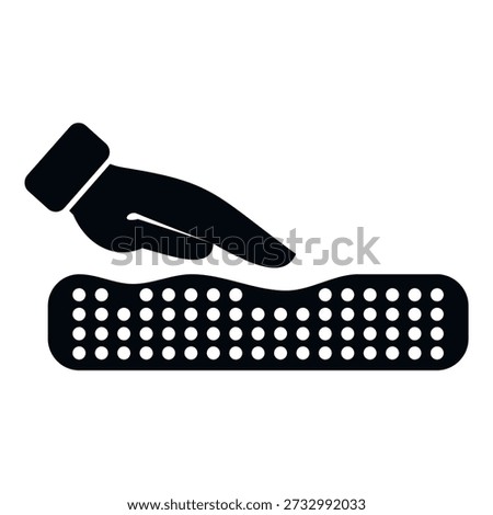 Hand pressing down on a mattress surface with pressure, creating an impression
