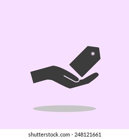 Hand and price tag