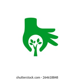 Hand protecting plant - nature conservation graphic. This illustration represents human concern for protecting plants and trees.