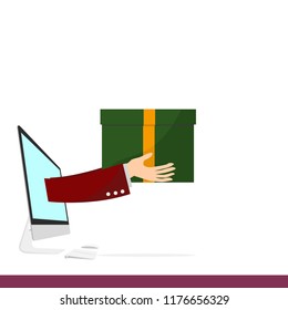 The hand protruding from the computer screen to deliver the parcel. Online Marketing Concept.