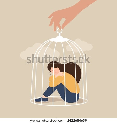 the hand of a psychologist opens a cage in which a sad girl sits. Psychological help concept. Treatment of depression concept