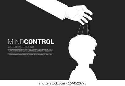 Hand Puppet Master controlling head of Silhouette of businessman. Concept of manipulation and micromanagement