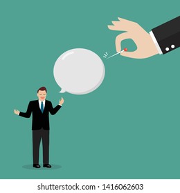 Hand pushing needle to pop speaking balloon. Business concept