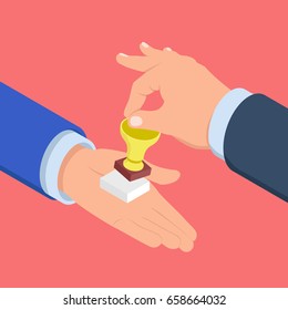 Hand puts the gold trophy in the other hand, concept of encouraging and reward isometric flat vector illustration