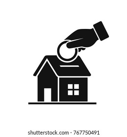 Hand putting coin inside the house icon. Vector investment concept in flat style, real estate investment.