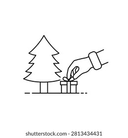 Hand putting gift under Christmas tree