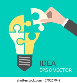 Hand putting missing piece into light bulb shaped puzzle. Idea, business, solution, creativity, genius concept. Flat style. EPS 8 vector illustration, no transparency