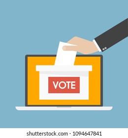 Hand putting paper in the ballot box. Voting concept.