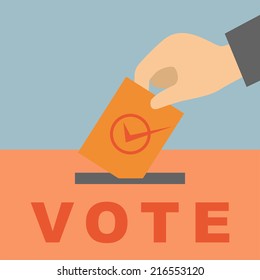 Hand putting a voting ballot in a slot of box