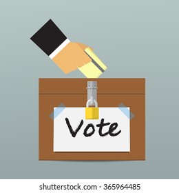 Hand putting voting paper in the ballot box