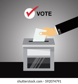  hand putting voting paper in the ballot box ,  voting ballot in a slot of box