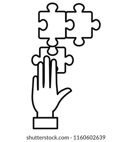 hand with puzzle game piece