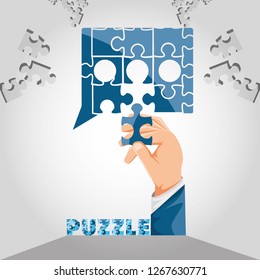 hand with puzzle pieces in shape speech bubble