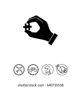 Hand with puzzle simple icon