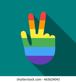 Hand in rainbow flag colors making the V sign with fingers icon in flat style on a turquoise background
