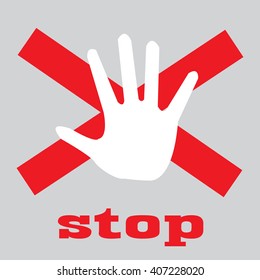 Hand raised with stop sign painted - isolated on grey background