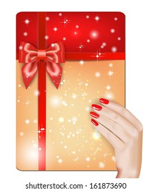 Hand with red manicure, red ribbon, bow on card