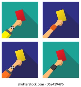 Hand with a red and yellow card of football