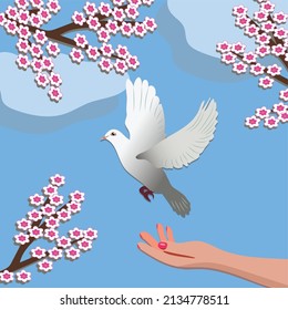 A hand releasing bird to freedom in spring time.